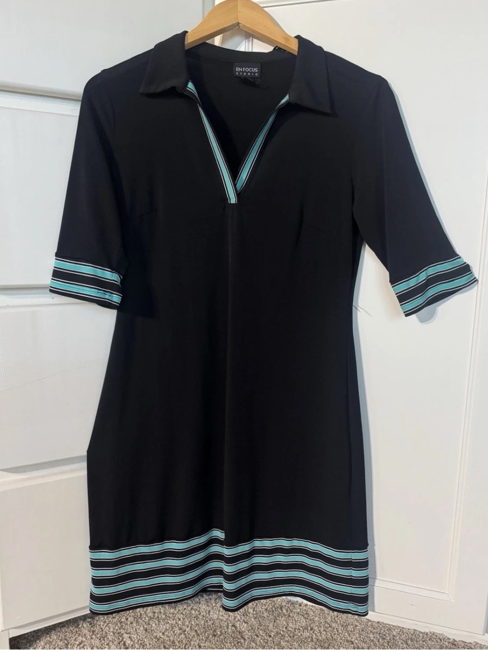 Enfocus Studio Black Knit Top with Subtle White Logo